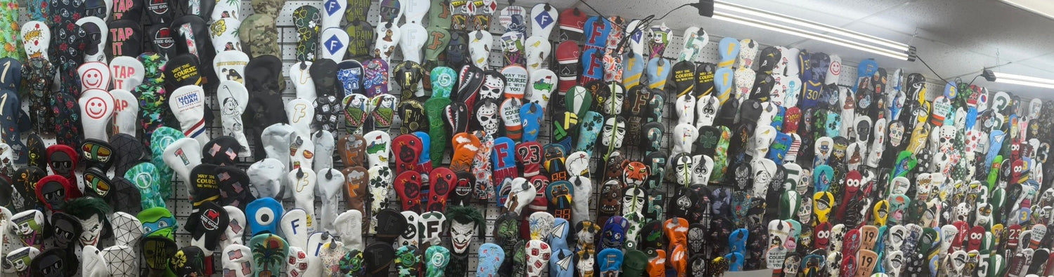 Retail display wall featuring a wide selection of custom, novelty, and branded golf headcovers at ParWest Golf.