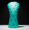 Plush golf driver headcover featuring the iconic vintage teal and geometric PDX airport carpet pattern.